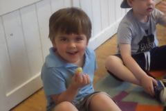 Eating potatoes grown in the Ridgeway Playgroup garden