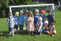 Pre-school leavers in front of the new football goals in the Ridgeway Playgroup garden