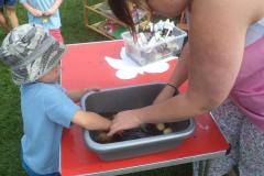 Washing the potatoes from the Ridgeway Playgroup garden